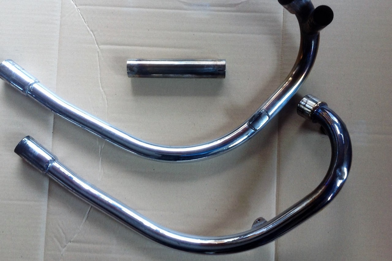 Customers downpipes from classic motorcycle in need of chroming.