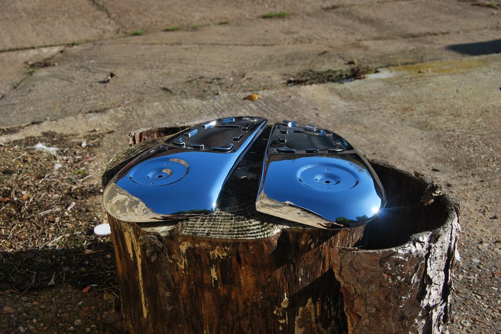 Actual photo set of engine covers fully restored in chrome.