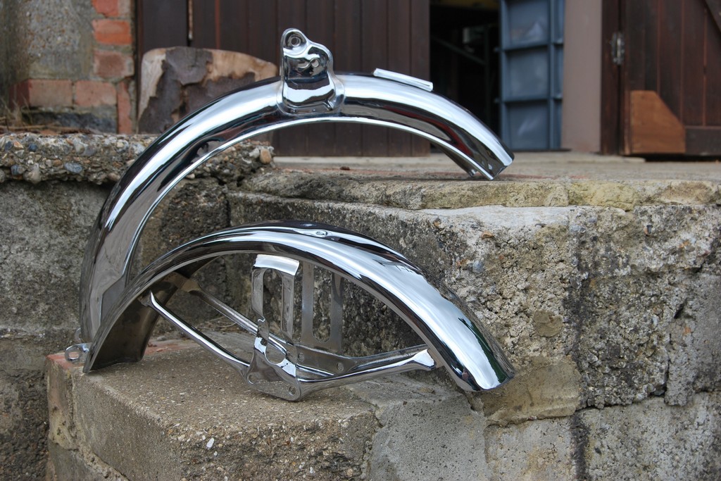 Actual photo of a set of mudguards restored and rechromed by Ashford Chroming.