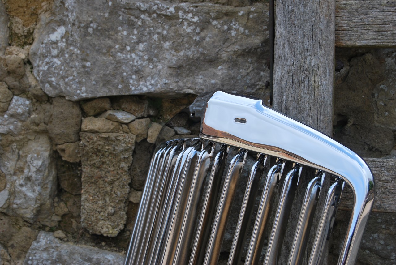 Vintage car grill restored in chrome - example of our work Ashford Chroming.