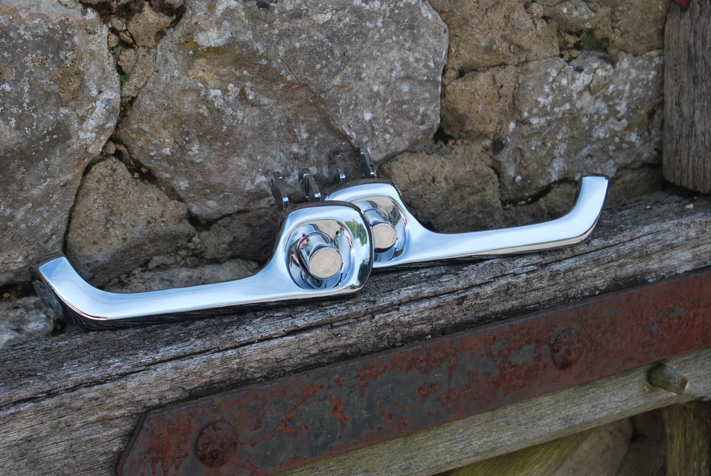 Actual picture of a set of classic door handles rechromed by Ashford Chroming.