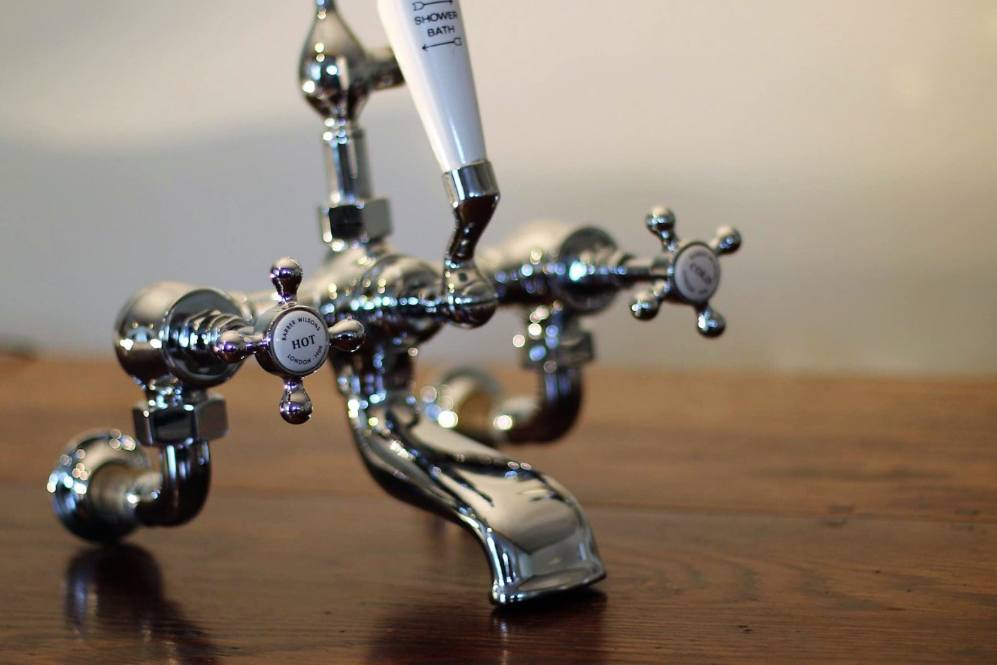 Picture of bathroom taps restored and chrome plated.