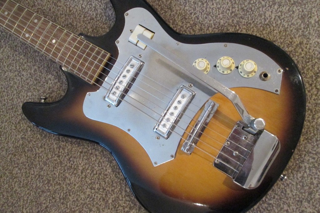 Photo of customers electric guitar with metal parts that require rechroming.